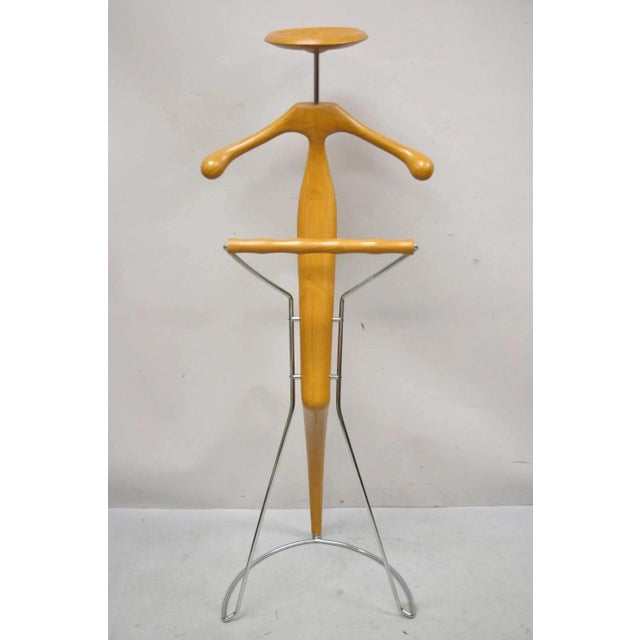 Porada Italian Post Modern Sculpted Walnut Wood and Chrome Clothing Suit Valet. Item featured is designed by Italian...