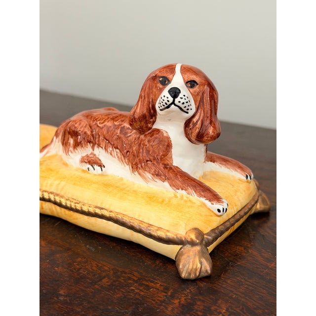 Pair of vintage porcelain Cavalier King Charles Spaniel figurines made in Italy for Jeanne Reed's of Williamsburg Va. What...