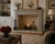 A handsome pair of Mid-Century brass fireplace andirons by The Harvin Co., featuring classic Federal styling with ball-...