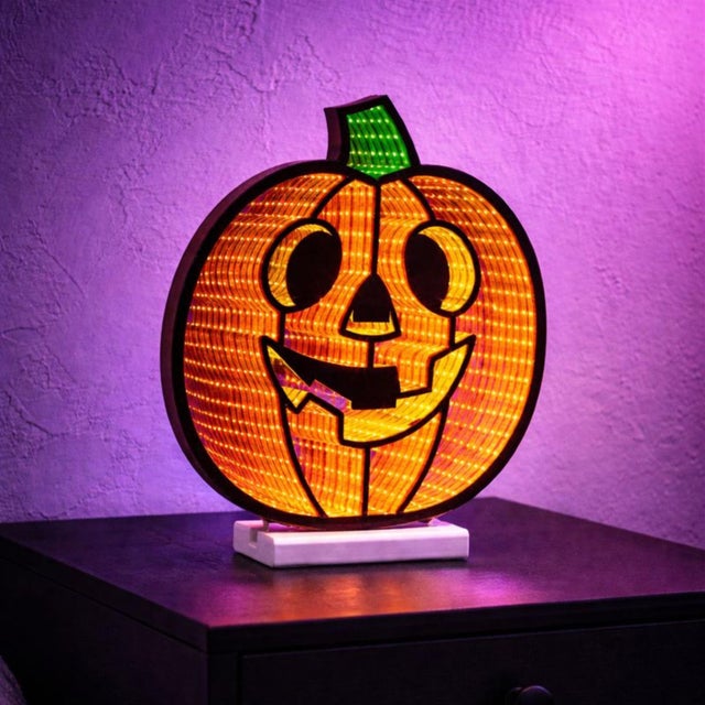 Spook up your Halloween decor with this classic Jack-o-Lantern Ekkolight! This glowing pumpkins features built-in LED...