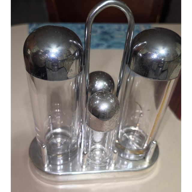 For sale: condiment service model 5070, designed by the famous Italian designer Ettore Sottsass for the Alessi company....