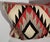 Navajo Indian weaving eye dazzler bolster pillow.The backing is a red linen and insert is down & feather fill.
