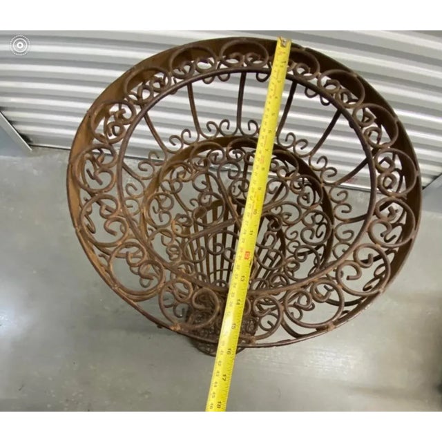 Vintage Mid Century Decorative Scrollwork Metal Plant Stand. Bronze colored. Dimensions: 43’ Tall x 15 3/4’ Width....