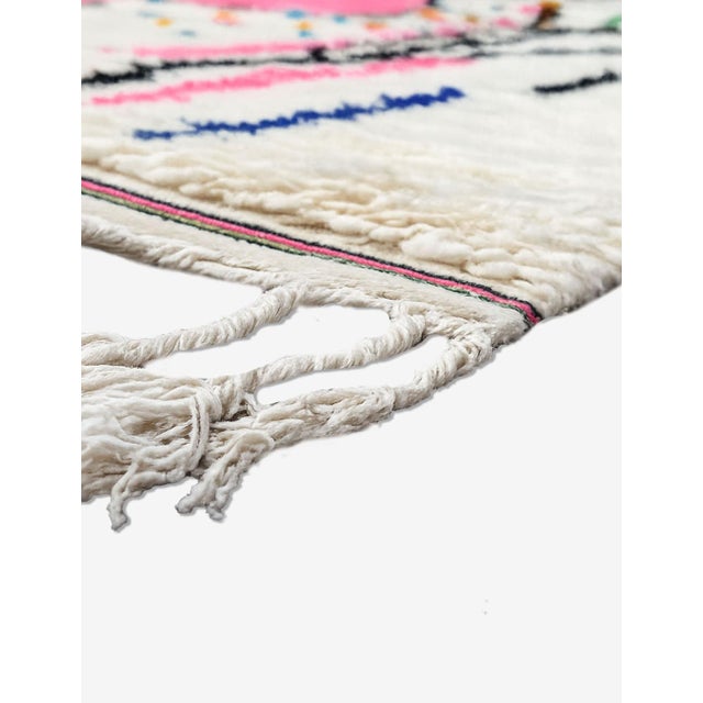 Modern Azilal Rug – Handmade Moroccan Berber Rug with Neon Pink Abstract Motifs This modern Azilal rug is a bold and...