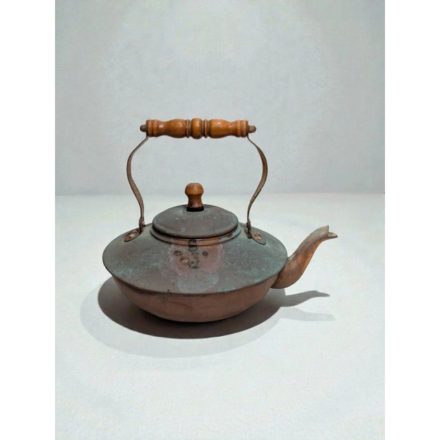 Step back in time with this beautiful 1950s vintage copper teapot, rich with authentic patina and rustic charm. Crafted...