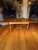 Bring timeless mid-century craftsmanship into your home with this stunning 1970s Ethan Allen solid maple draw-leaf dining...