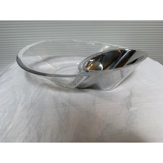 Design Plus Gallery presents the Butterfly Serving Bowl Dip Set by Neil Cohen for Nambe. The dish has a label stating...