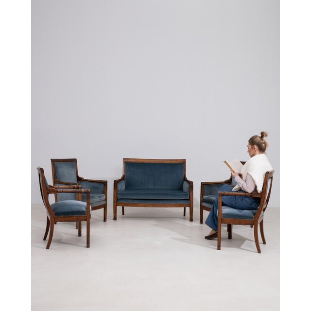 This chair makes its impression through dark walnut, tapered angular. Dating to 1820s and originating from France, it...