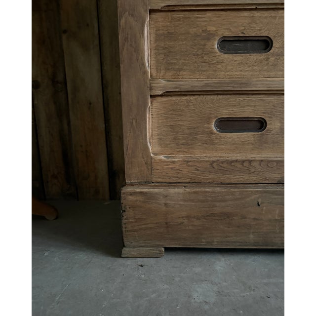 A historic antique piece of professional furniture, this solid oak notary's cabinet captivates with its architectural...