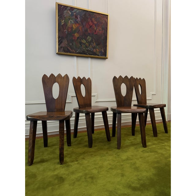 Set of four "king" or "crown" side chairs, attributed to Olavi Hanninen, sourced from France Primitive and organic,...