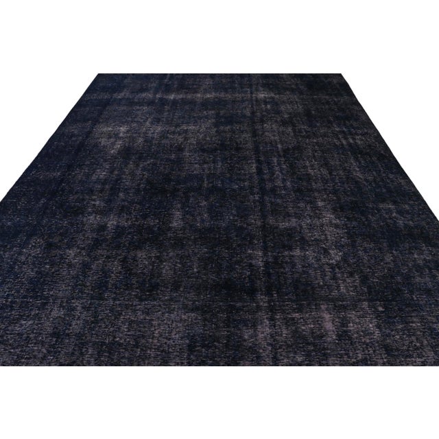 From our new collection of overdyed rugs, a vintage 10x12 Persian rug originating circa 1970-1980 or possibly earlier. On...