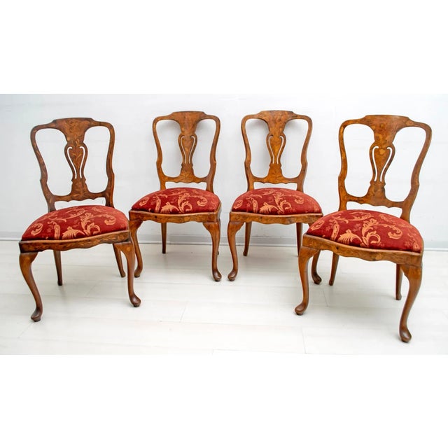 4 Dutch chair of the mid-20th century. Chairs of exceptional quality, richly inlaid with walnut and maple. The upholstery...