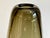 An impressive, thick-walled, smoked glass vase in the style of Wilhelm Wagenfeld or Heinrich Löffelhardt from the 1960s....
