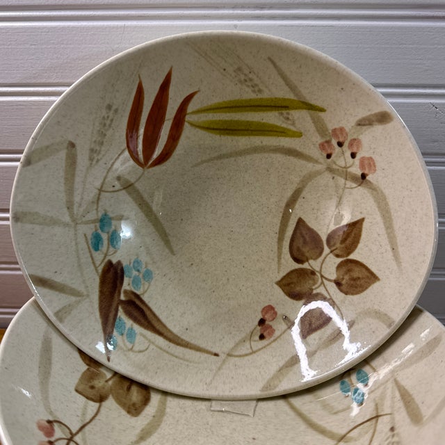 Beautiful set of mid-century modern round vegetable serving bowls manufactured by Red Wing Pottery in the 1950s. Part of...