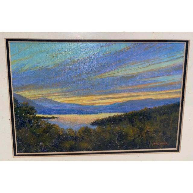 Lovely original oil of the sunset by New Hampshire artist Cam Sinclair. Oil on board measures 8” x 10”. Framed under glass...