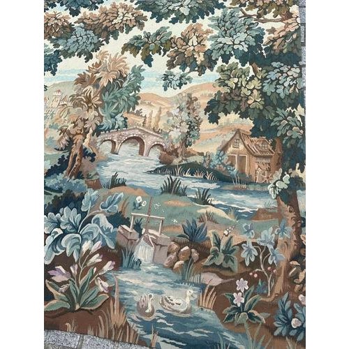 Discover the timeless elegance of this late 20th-century Aubusson tapestry featuring a captivating design of a man near a...