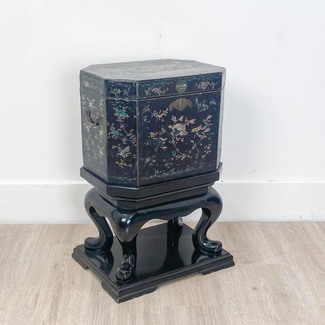 A Nagasaki shell-inlaid lacquer box on later stand.