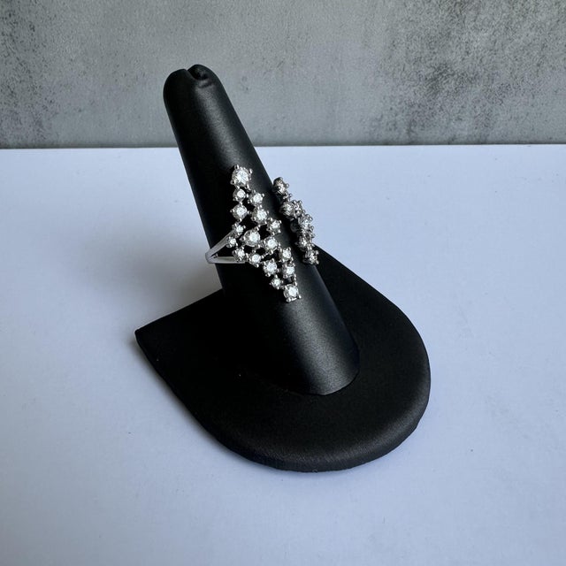 This stunning Diamond Fashion Ring in 14kt white gold features 1.50ctw of natural HI SI2-I1 round diamonds, creating a...