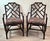 A vintage pair of Chinese Chippendale bamboo & rattan armchairs. Features open fretwork detail with a rich chocolate...
