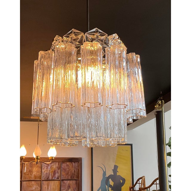 Illuminate your space with this breathtaking mid-century modern chandelier crafted in West Germany during the 1960s by the...