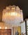 Illuminate your space with this breathtaking mid-century modern chandelier crafted in West Germany during the 1960s by the...