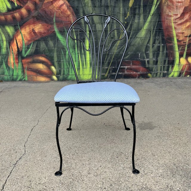 Salterini outdoor patio dining chair with floral stem design Seat height - 19” Seat depth - 16” Chair is not marked