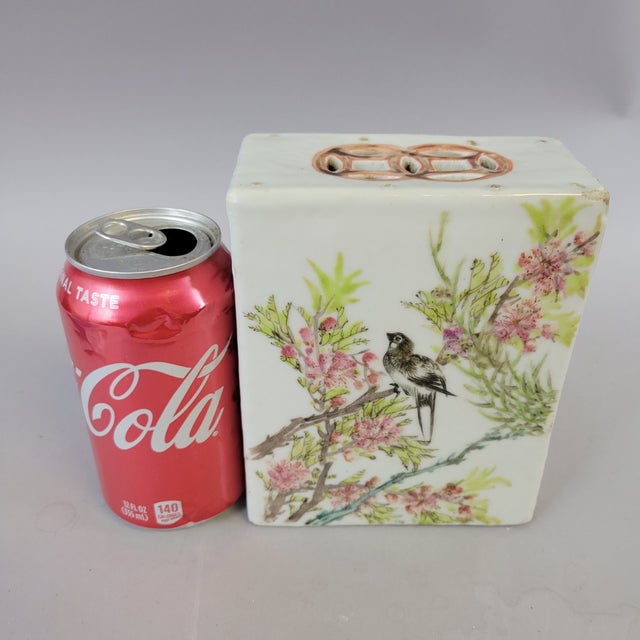 A finely painted Republic-period porcelain incense holder, decorated in soft famille-rose enamels with a lady in a garden...