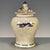 A charming Chinese blue and white porcelain covered jar featuring a heavy, all-over crackle glaze. The jar has a classic...