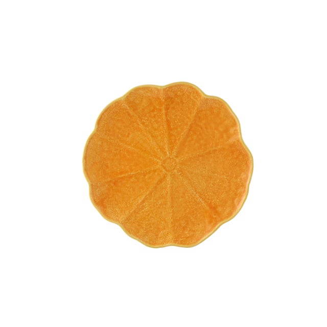 Based on the pumpkin terrine, one of Bordallo Pinheiro's most iconic decorations, a table line and serving articles were...