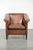 This beautiful, sleek Art Deco-style armchair / fauteuil in sheepskin leather features black piping and a rich warm...