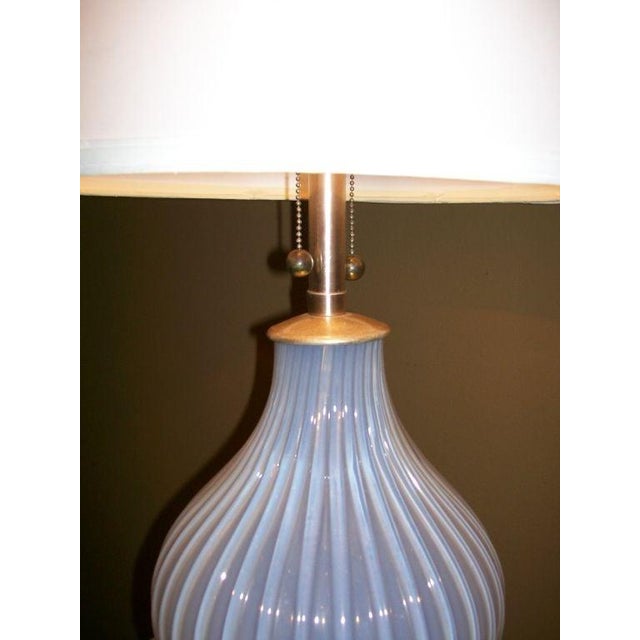 This tall and elegant Murano glass lamp has soft lilac tones that delve in to white or silver depending on the light...