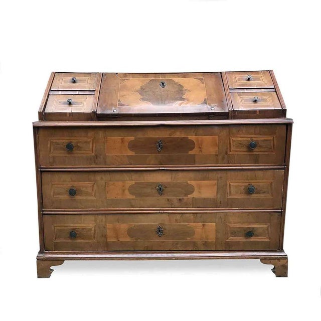 Antique Trentino Drop-Leaf Chest Veneered in walnut, decorated with geometric maple and cherry trim. The front of this...