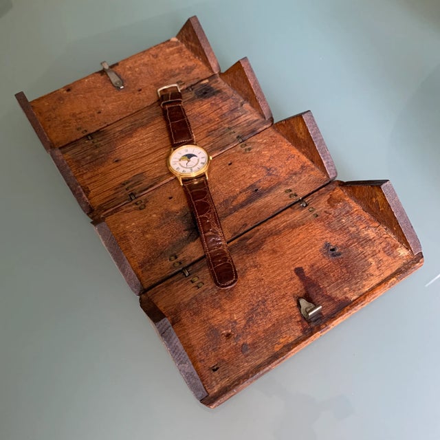 Originally designed by the Singer Manufacturing Company to house small sewing machine parts, this clever oak box has a...