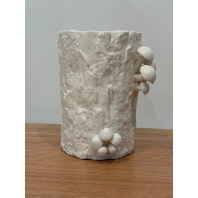 The Branch Vases, which come in a smaller and larger size, and are fanciful and resemble tree trunks with all the growths...