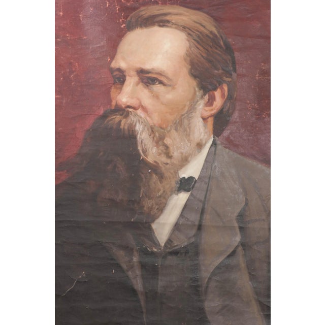 A heavily bearded Friedrich Engels stares into the distance in this massive 19th century German canvas portrait,...