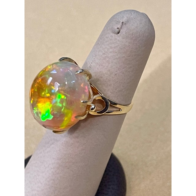 2010s 12 Carat Oval Shape Ethiopian Opal Cocktail Ring 14 Karat Yellow Gold For Sale - Image 5 of 18