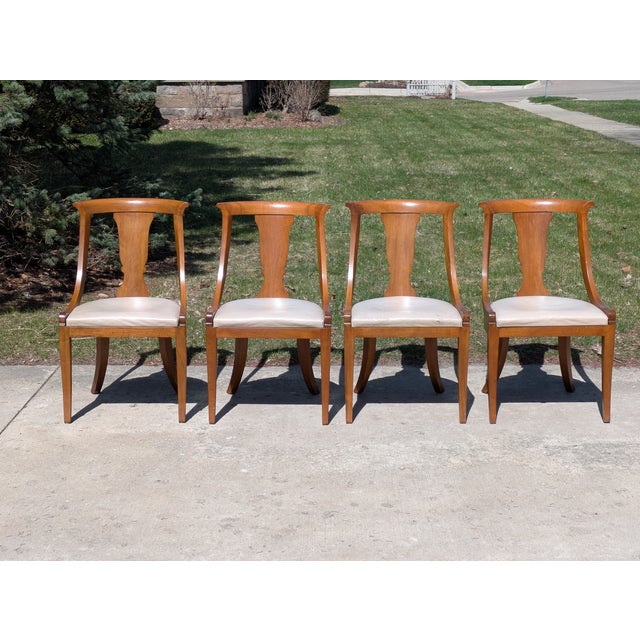 Featured is this set of 4 Baker Klismos style regency dining chairs. these chairs are in as found all original condition...