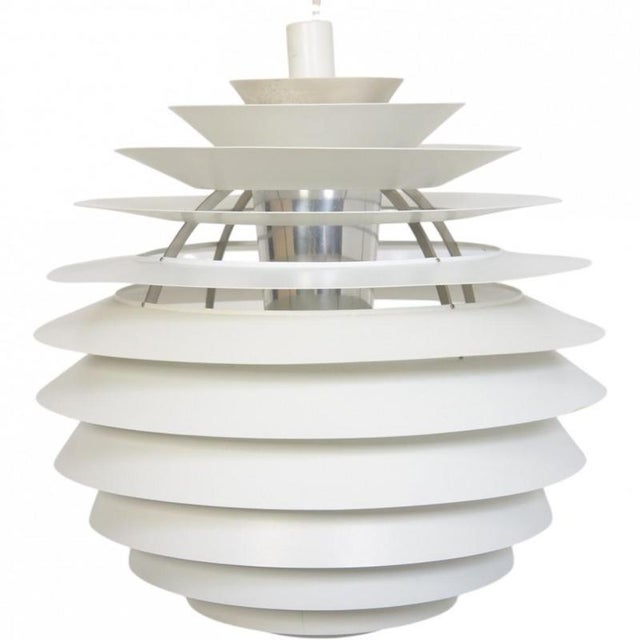 Poul Henningsen Louvre lamp with white metal shades. The lamp is from the 1980s and appears with some dents in the shades...
