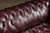 Burgundy Mid 20th Century Deep Oxblood Leather Chesterfield Sofa With Nailhead Trim For Sale - Image 8 of 12