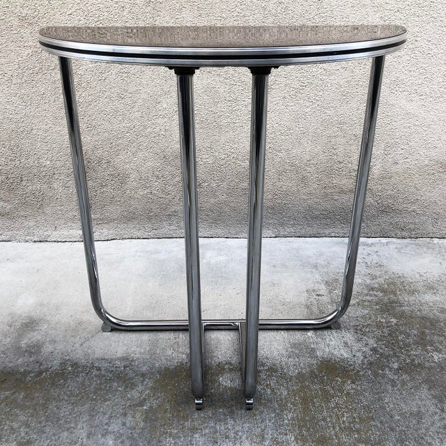 We present to you another classic 1930's bent chrome steel tube piece from our collection. It is a streamline moderne...