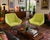 Pair of authentic Keilhauer Cahoots swivel lounge chairs in a striking lime green upholstery. Designed in collaboration...