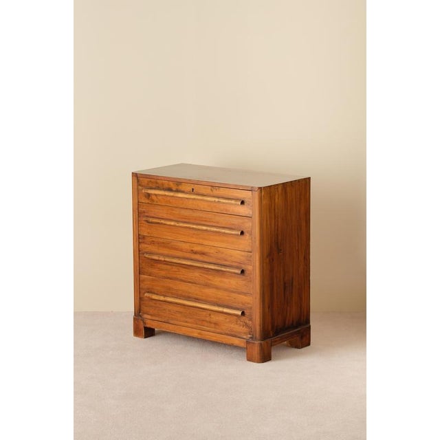 Rare Swedish bureau / chest of drawers in dark stained pine. Produced in Sweden, 1930s. This piece is attributed to the...
