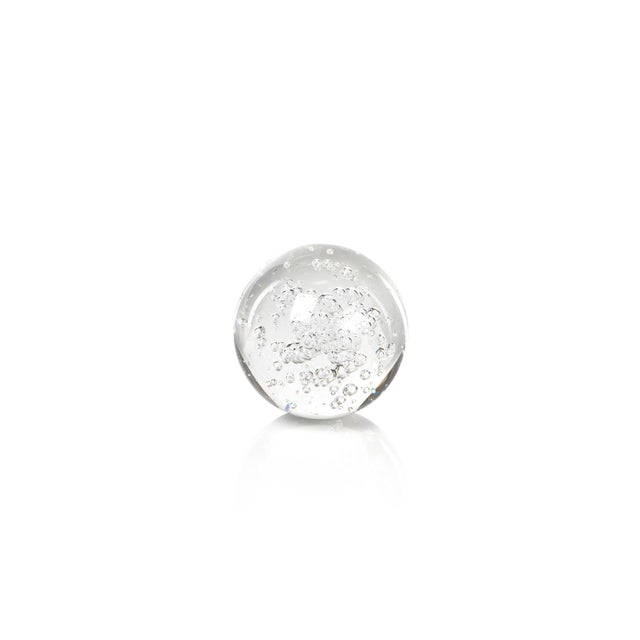 Strikingly simple, our gorgeous glass orb set reflects light with its unique internal bubbling and brilliant surface....