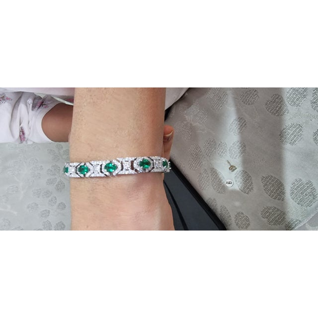 This is a wonderful natural Zambian Emerald tennis bracelet. it has very high quality emeralds and very good quality...