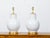 A pair of Asian porcelain ginger jars mounted as table lamps and wired for the USA. This pair of lamps exudes timeless...