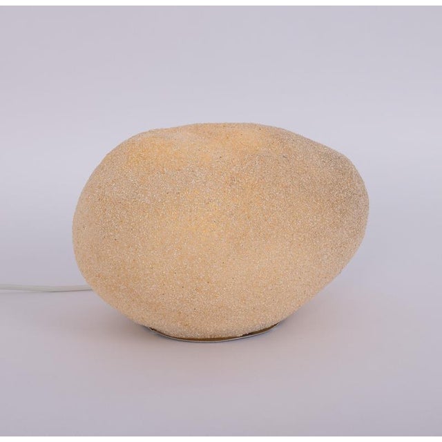A rare and highly desirable “dora” moon rock lamp by andré cazenave , italy, dating from the 1970s. This example stands...