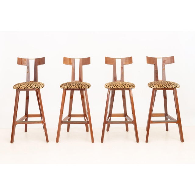 Set of Four Mid-Century Modern Mahogany Leopard Print Mohair Bar Stools, on four tapered legs. 45" H x 17" W x 19.75" D;...