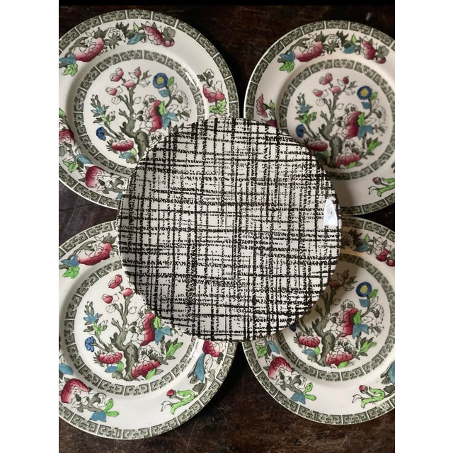 We especially love the added detail of these 4 bowls. Each has the swirling handle that is so very mid century in design!...