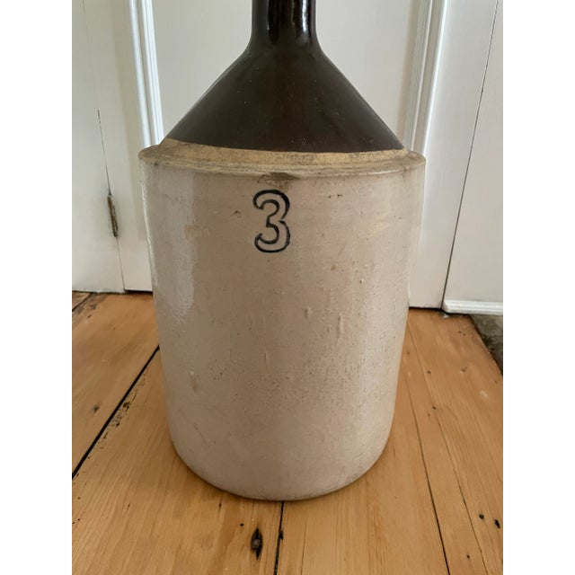 Rustic antique stoneware jug. Deep brown glaze. “3” embossed on the side. Wonderful kitchen decor or rustic vase large...