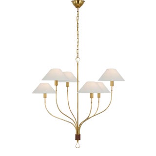 Amber Lewis for Visual Comfort Signature Griffin Large Staggered Tail Chandelier in Hand-Rubbed Antique Brass and Saddle Leather with Linen Shades For Sale